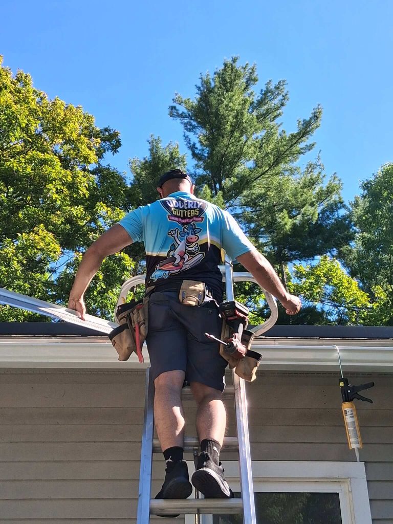 gutter contractor installing guards